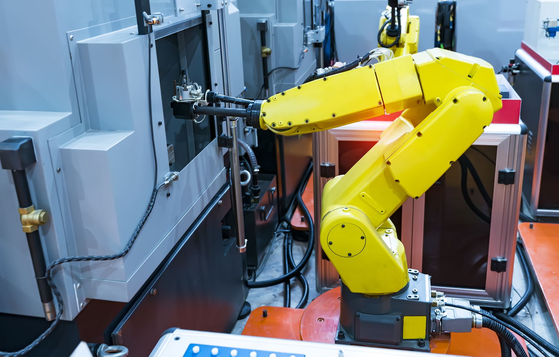 FANUC robot tending a CNC machine