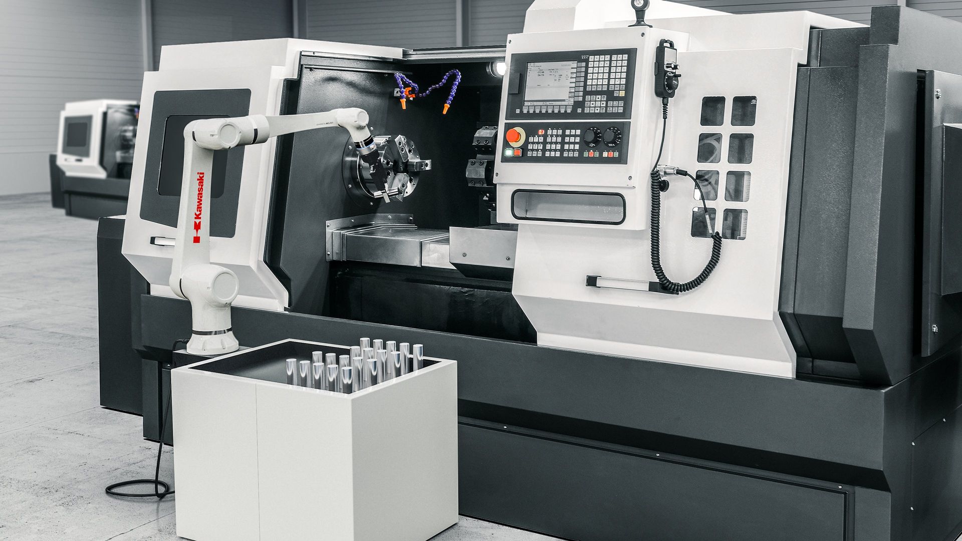 Kawasaki robot tending a CNC lathe