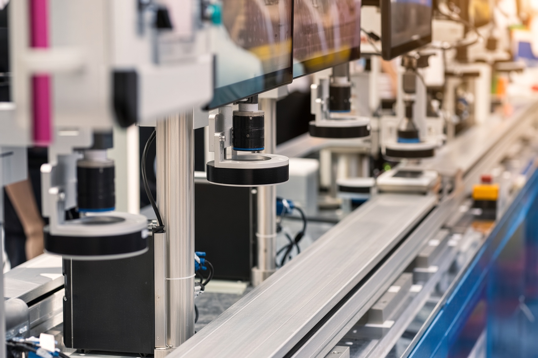 Machine vision cameras inspecting parts on a conveyor